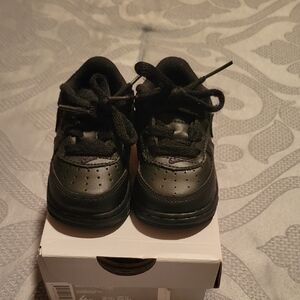 Size 4 Nikes (baby)